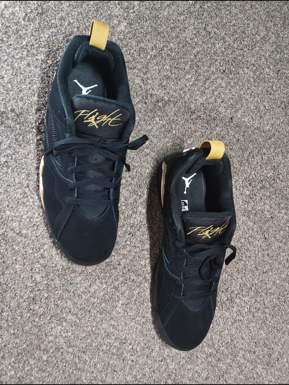 Jordan Low Top Sneakers - Black with Gold Pull Tabs